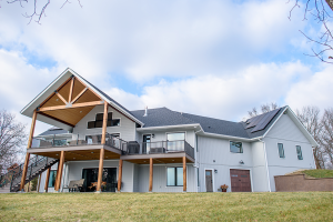 Geothermal For All 15 greenville lake house exterior back 1 Geothermal For All